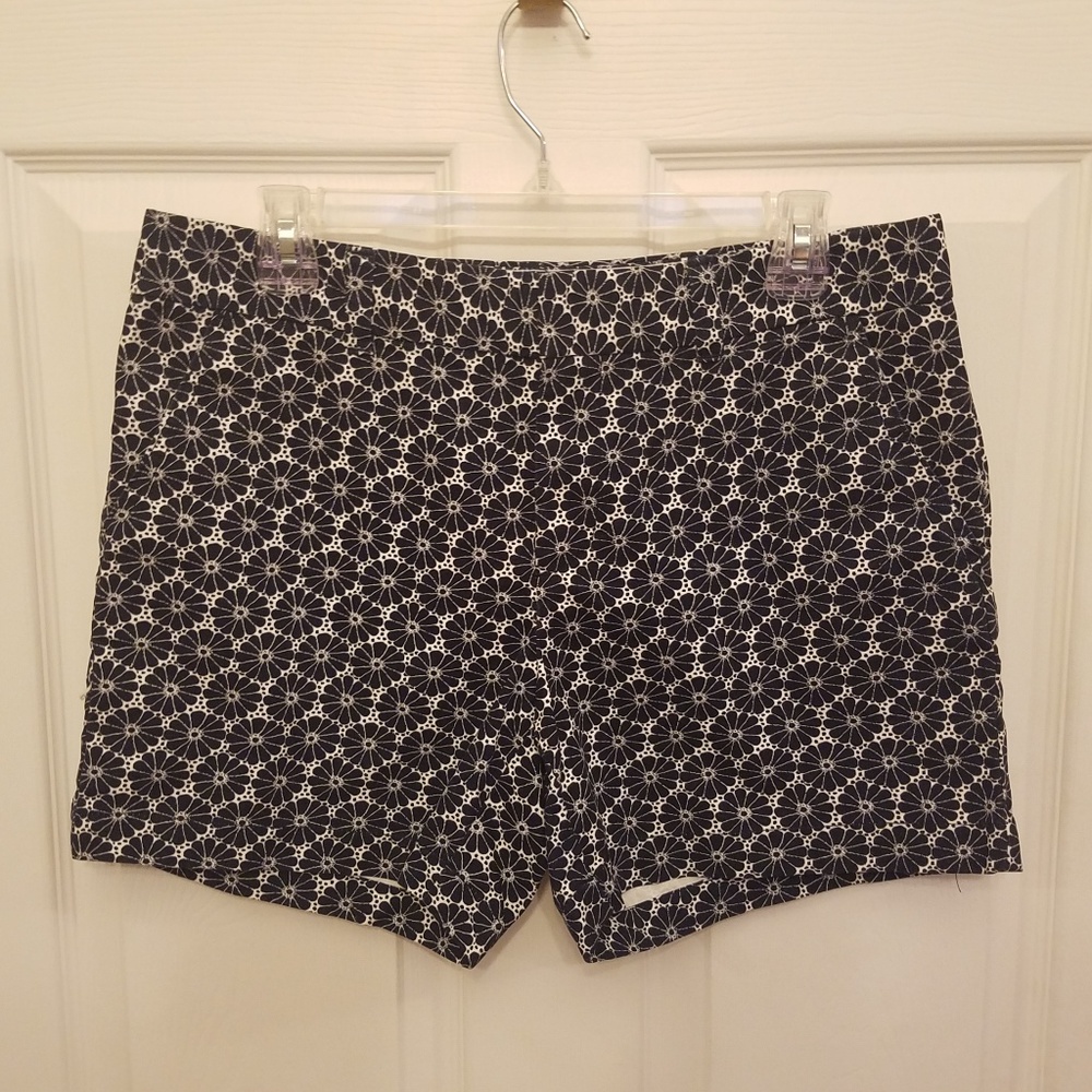 **2/15**Tommy Hilfger Blue & White Floral Shorts 8